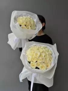 Photo of bouquet "Bouquet 31 White Roses Paper Wrap “Silent Reverie” Ayia Napa" — Flower delivery in Ayia Napa, photo 1 of 1