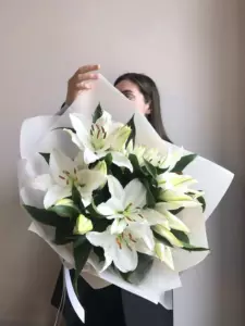 Photo of bouquet "Bouquet 7 White Lilies in Paper Wrapping “Silent Reverie” Ayia Napa" — Flower delivery in Ayia Napa, photo 1 of 1