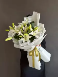 Photo of bouquet "Bouquet 9 White Lilies Silk Ribbon “Emerald Whisper” Ayia Napa" — Flower delivery in Ayia Napa, photo 1 of 1