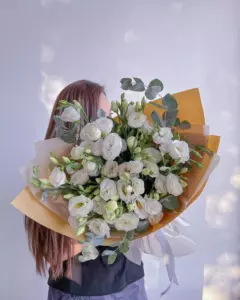 Photo of bouquet "Bouquet 11 White Eustoma Paper Wrapping “Silent Whispers” Ayia Napa" — Flower delivery in Ayia Napa, photo 1 of 1