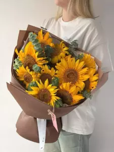 Photo of bouquet "Bouquet 11 Sunflowers White Silk Ribbon “Silent Reverie” Ayia Napa" — Flower delivery in Ayia Napa, photo 1 of 1
