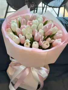 Photo of bouquet "Bouquet 51 Tulips Paper Wrapping “Whispering Petals” Bali" — Bali - Flowers Delivery Flowers Place, photo 1 of 1