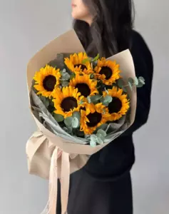 Photo of bouquet "Bouquet Seven Sunflowers Paper Wrap “Golden Radiance” Da Nang" — Flower Delivery in Da Nang | Flowers Place, photo 1 of 1